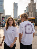 Man and woman wearing the Be Feared Be U – Organic Oversized Tee downtown