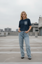 Woman in navy tee urban city